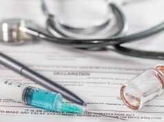 Update on Ongoing Exactech Lawsuit A stethoscope, a syringe, a vial, and a pen on top of a medical declaration form.