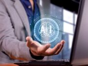 Discover the Future of Orthopaedics: AI and Deep Learning Webinar A person holds a holographic representation of artificial intelligence (AI) above a laptop, symbolizing futuristic innovation.