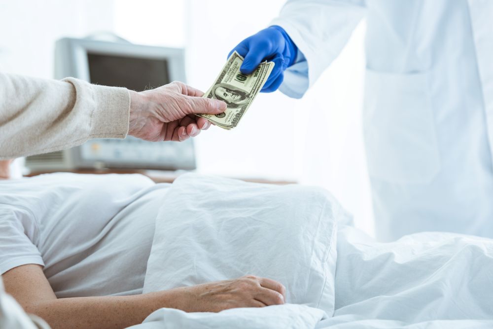 partial view of sick patient and senior man giving bribe