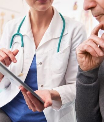 Digital Ortho Data Privacy – Part 2: Communication, Consent, and Patient Trust in a Digital Workflow doctor-showing-examination-results-on-the-digital-tablet