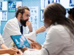 Where Clinical Guidelines Lag Behind Surgical Innovation medical-professionals-in-a-meeting-examining-charts