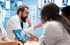 Where Clinical Guidelines Lag Behind Surgical Innovation medical-professionals-in-a-meeting-examining-charts